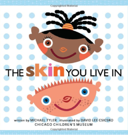 The cover of the children's book The Skin You Live In, written by Michael Tyler and illustrated by David Lee Csicsko, featuring cartoon images of diverse children