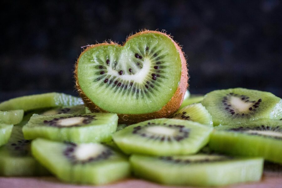 Slices of kiwifruit, one of which is in the shape of a heart